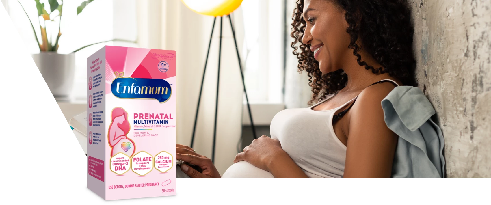 Pregnant mom with Enfamom™ Prenatal Vitamin