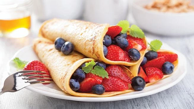 Crepe filled with blueberries and strawberries