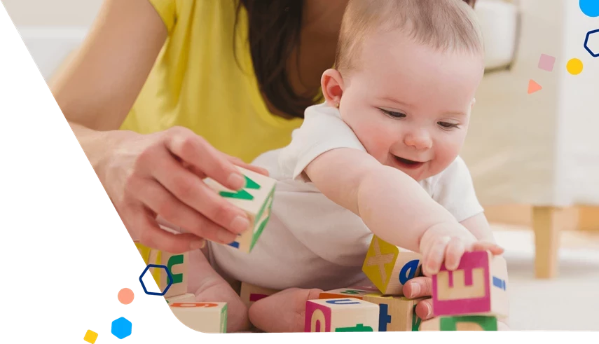 Mom and baby playing with blocks
