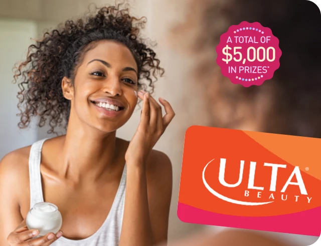 Woman putting on makeup with Ulta Beauty gift card and A total of $5,000 in prizes