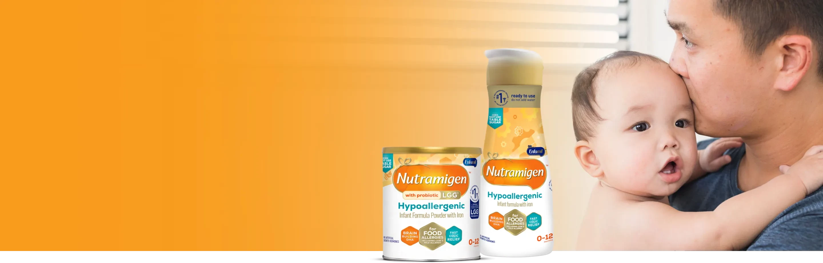 Dad kissing baby on the forehead, Nutramigen® product lineup